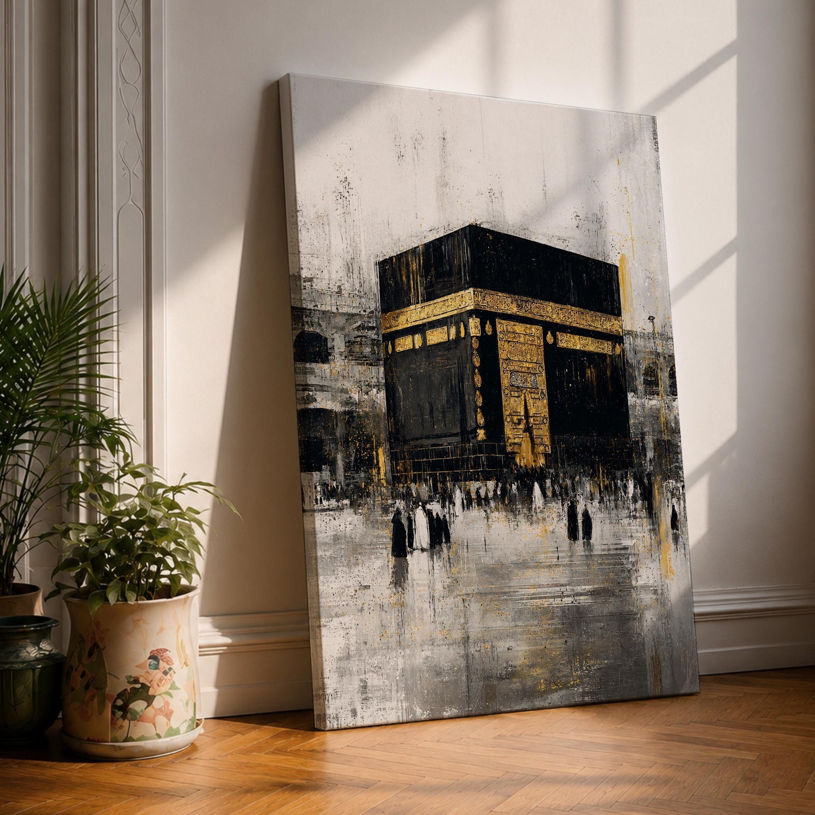 Elegant Kaaba wall art featuring the Holy Kaaba adorned with gold detailing, surrounded by worshippers in a textured abstract composition. Neutral black, gold, and ivory tones create a sophisticated Islamic canvas perfect for prayer rooms, living spaces, and Muslim home decor.